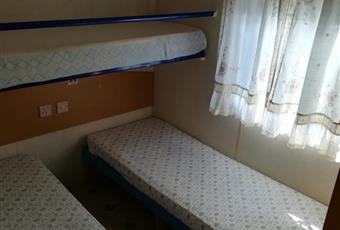 due camere da letto: una con letto matrimoniale e una con tre lettini ad una piazza singola Sicilia AG Agrigento